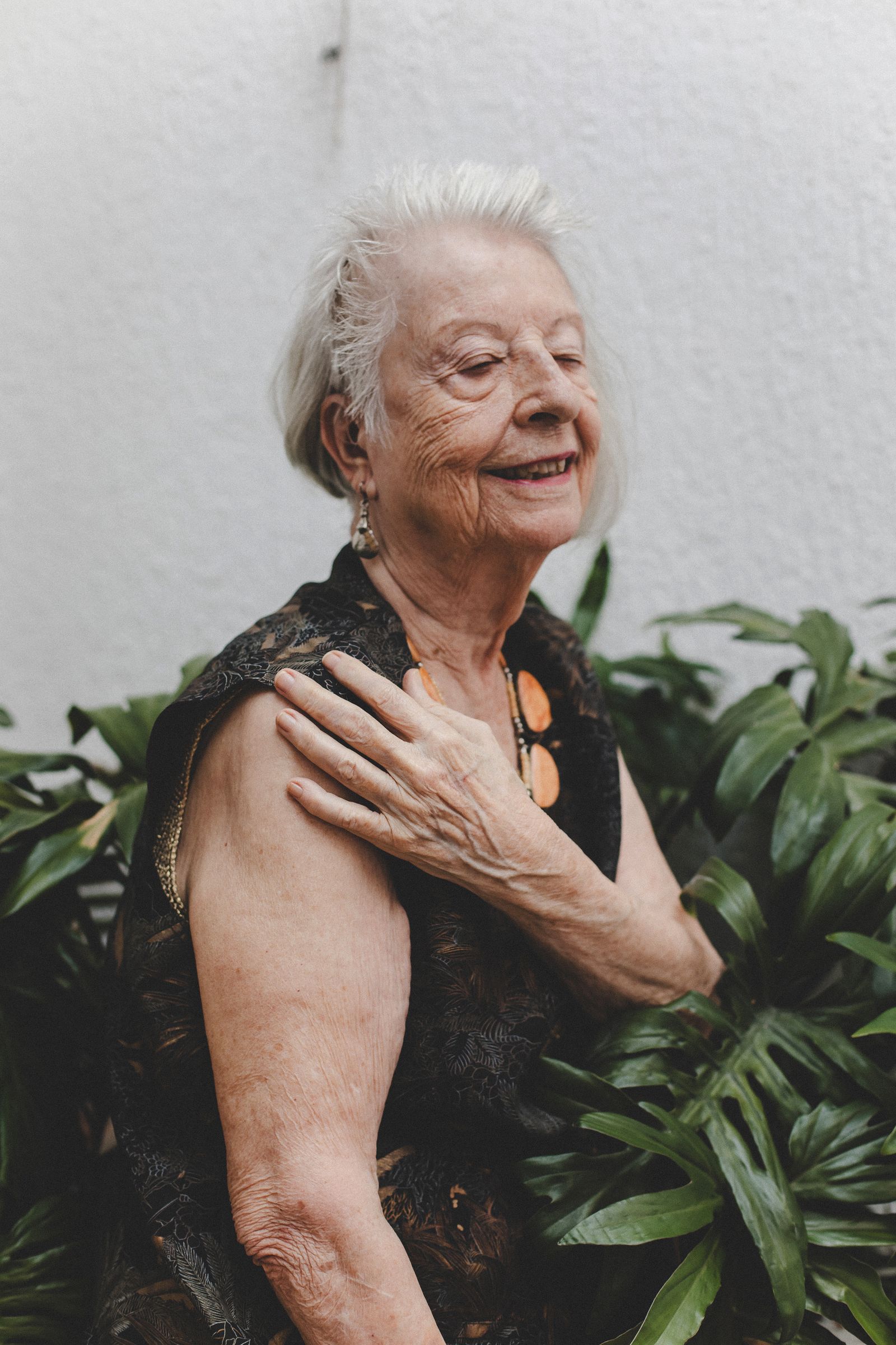 Smiling older woman in a garden