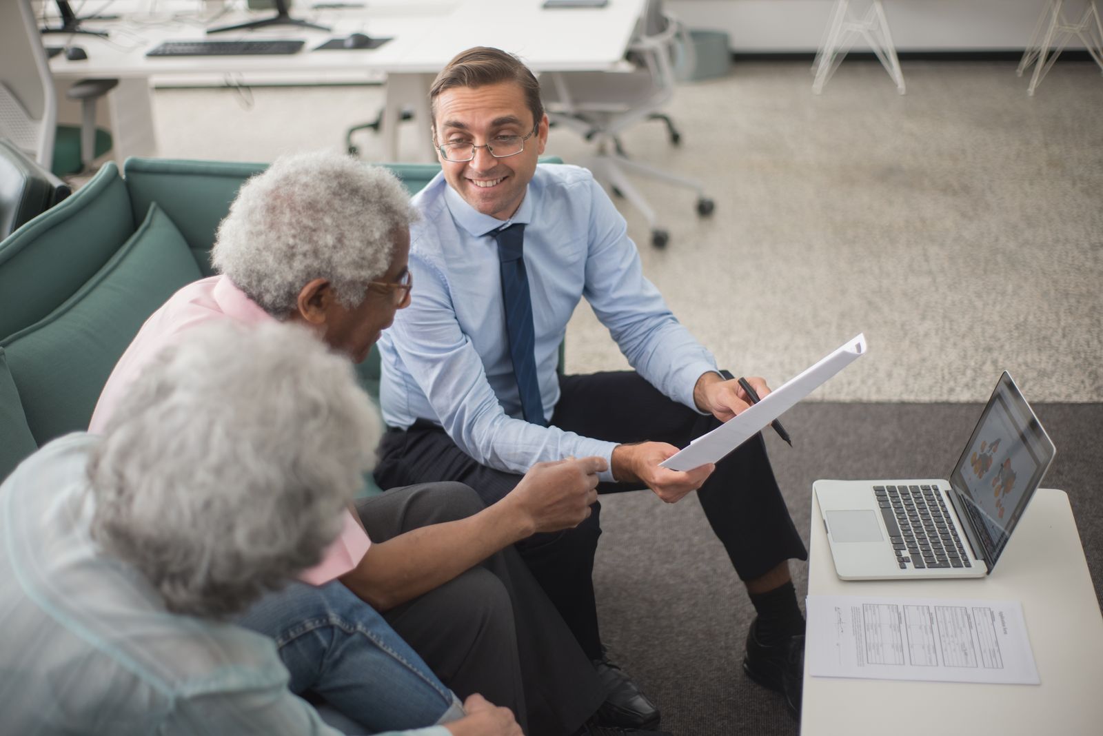 Silver Oak advisor walking a retired couple through plan documents
